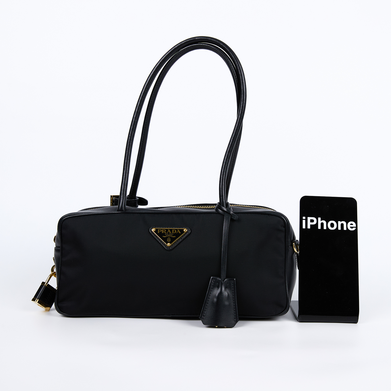 普拉達 PRADA Re-Nylon East-West 尼龍 肩背包 手提包 1BB127_2C8Q 黑尼龍拚皮革鎖頭肩背包 防塵袋/鎖組/發票