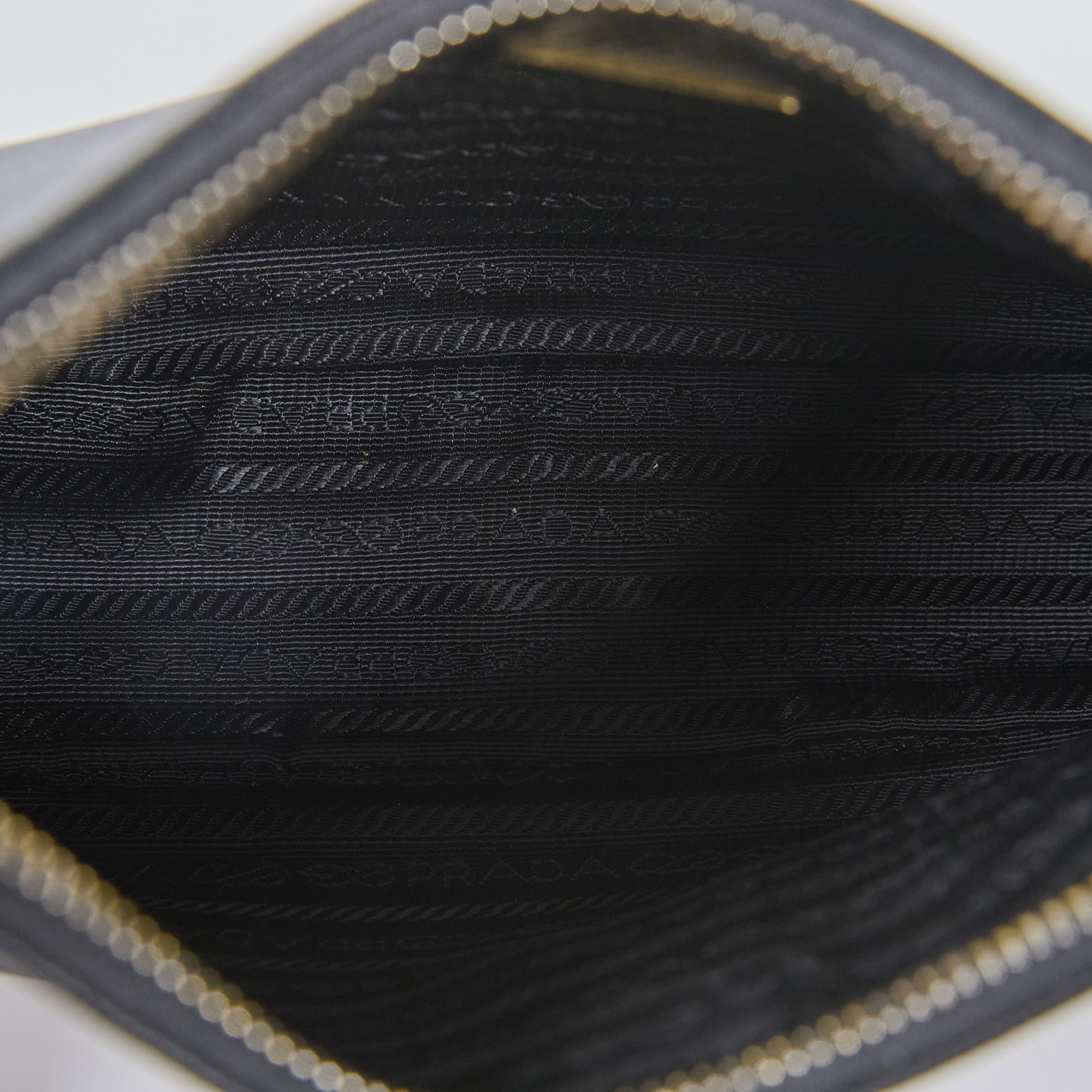 普拉達 PRADA Re-Edition 2005 Saffiano皮革手袋 1BH204_NZV 黑色皮革三合一 防塵袋